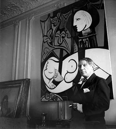 picasso_bw_photo_infront_of_his_painting, 1933-cecil-beaton.jpg