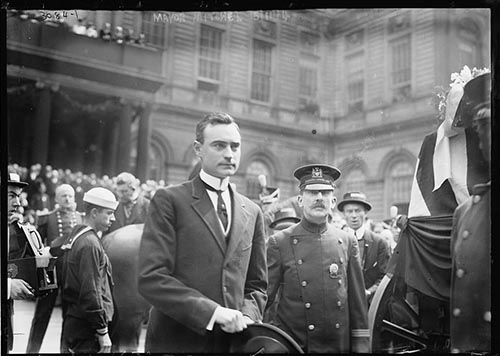 z-John_Purroy_Mitchel_at_City_Hall_on_May_11,_1914_at_the_memorial_service_for_the_17_U._S._sailors_who_died_at_Vera_Cruz.jpg