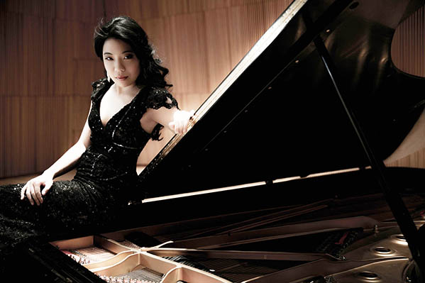 Joyce-Yang-on-top-of-piano.jpg