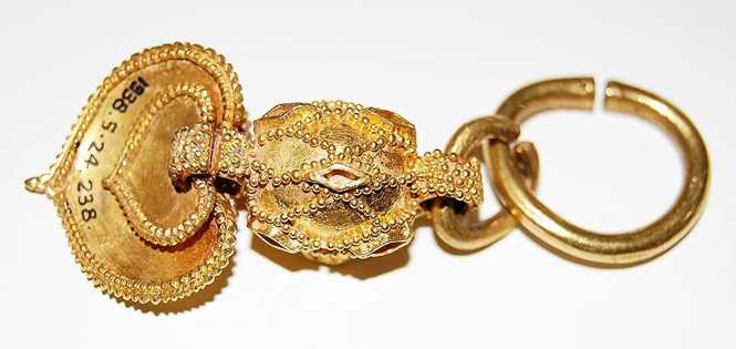 Gold earring crop.jpg